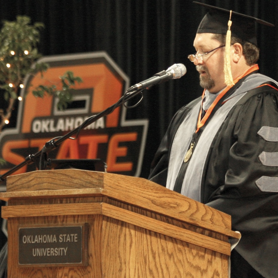 Dr. Ferrell administrating the Veterinary Oath to the 2012 OSU graduating seniors while serving as the President for the OVMA. Dr. Ferrell administrating the Veterinary Oath to the 2012 OSU graduating seniors while serving as the President for the OVMA.